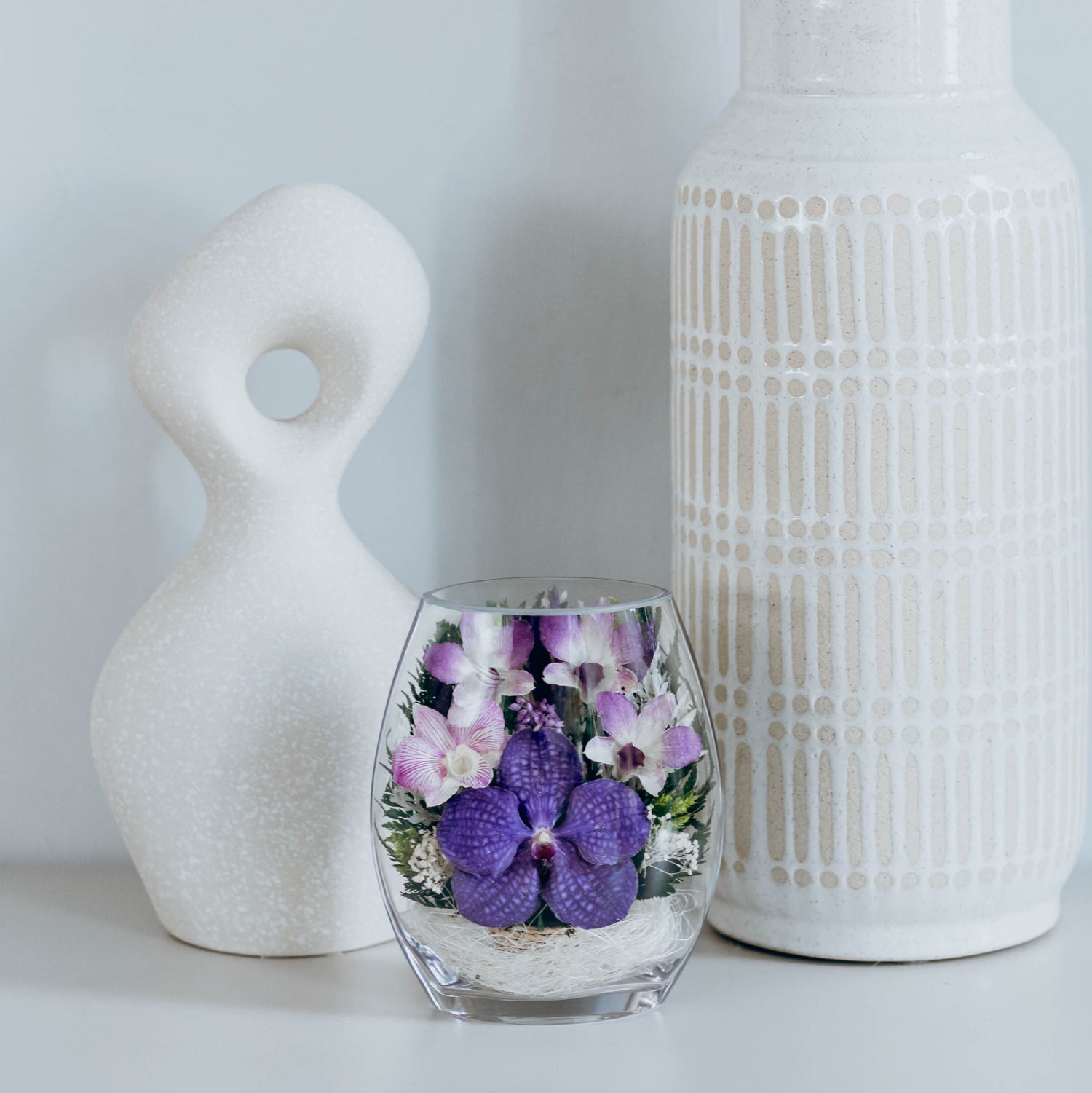 Orchideen in Glas